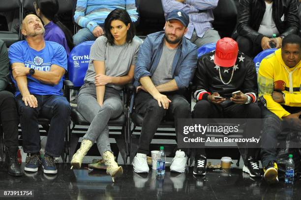 Model Kendall Jenner, producer Michael D. Ratner and boxer Floyd Mayweather attend a basketball game between the Los Angeles Clippers and the...