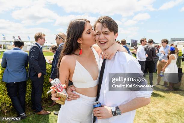 Racegoers enjoy the atmosphere during New Zealand Trotting Cup Day at Addington Raceway on November 14, 2017 in Christchurch, New Zealand.