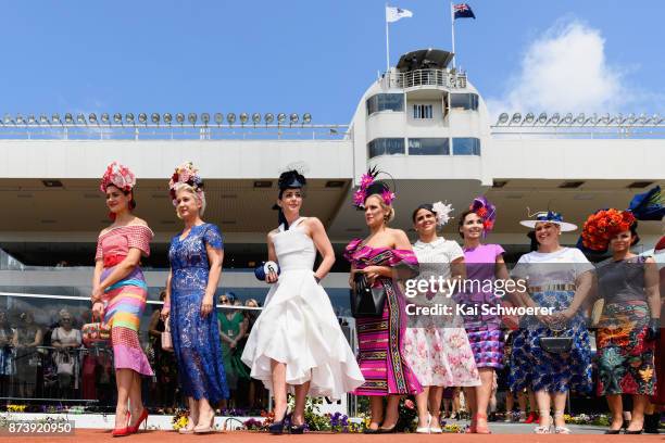 Competitors of the Best Dressed Lady competition look on during during New Zealand Trotting Cup Day at Addington Raceway on November 14, 2017 in...