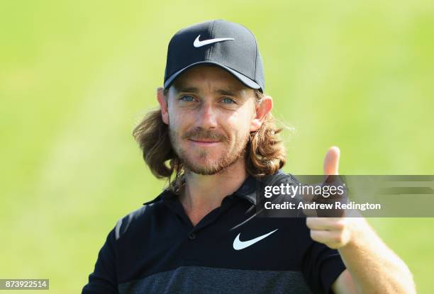 Tommy Fleetwood of England gives the thumbs up during the Pro-Am prior to the DP World Tour Championship at Jumeirah Golf Estates on November 14,...