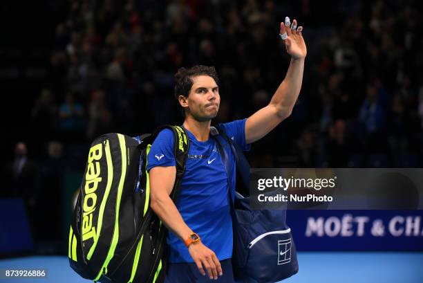 Rafael Nadal of Spain leaves the court after he was defeated in his Singles match against David Goffin of Belgium during day two of the Nitto ATP...