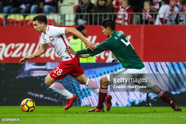 Jakub Swierczok , Hugo Ayala during the International Friendly match between Poland and Mexico at Energa Stadium in Gdansk, Poland on November 13,...
