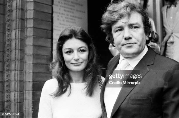 Albert Finney marries French actress Anouk Aimee at Kensington registry Office. After the ceremony the bride left the Register Office wearing no...