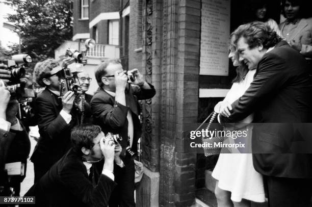 Albert Finney marries French actress Anouk Aimee at Kensington registry Office. After the ceremony the bride left the Register Office wearing no...