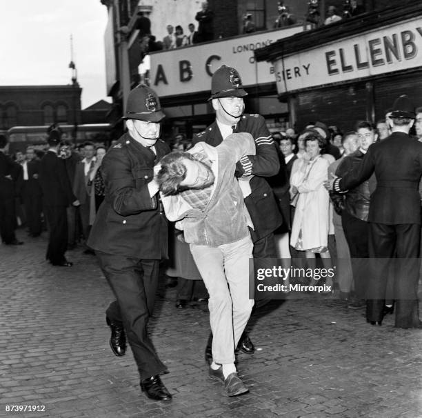 Large crowd gathered in Ridley Road, E8 to demonstrate against former fascist leader Sir Oswald Mosley and members of his anti-Semitic Blackshirt...