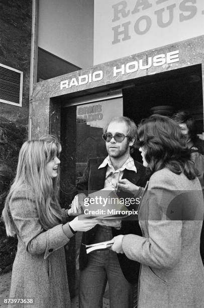 Elton John makes a whistle-stop visit to Birmingham and spends an hour as a disc jockey at BRMB radio studios. He joins regular DJ Adrian Juste,...