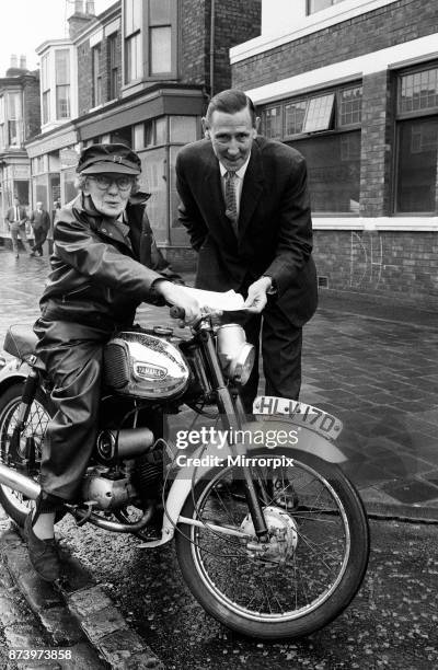 Florrie Ball is given a cover note for her insurance for her motorbike insurance by broker Arthur Edwards, 11th February 1969.