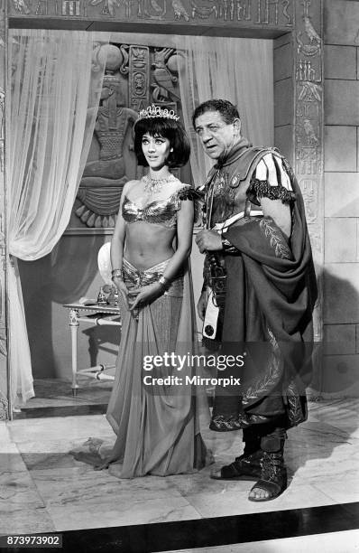 Amanda Barrie and Sid James on the set of 'Carry on Cleo' at Pinewood Studios, Buckinghamshire, 4th August 1964.