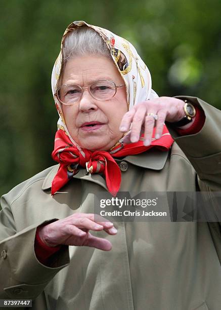Queen Elizabeth II gestures as she attends the Royal Windsor Horse Show 2009 on May 16, 2009 in Windsor, England.