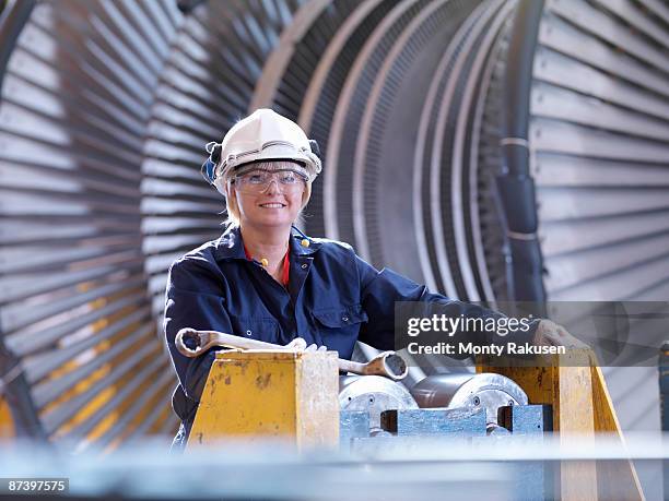 female engineer with turbine - female development stockfoto's en -beelden