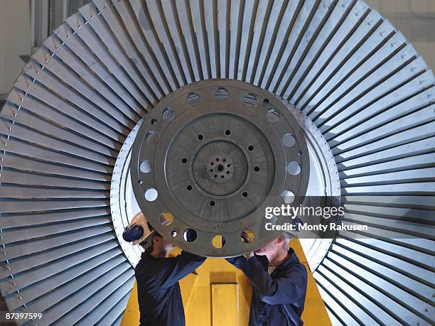 engineers working on turbine - oil refinery stock pictures, royalty-free photos & images