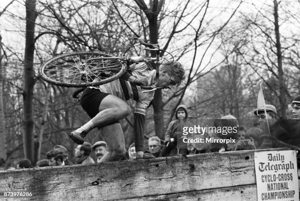 British National Amateur Cyclo-Cross Championships at Crystal Palace. John Atkins, the holder of the Viking trophy, seen here jumping over the hurdle...