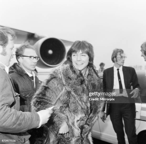 David Cassidy, singer, actor and musician, leaves London's Heathrow Airport in 1973, after some sell out shows. Three thousand screaming teenage fans...