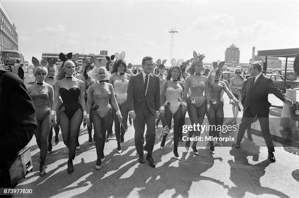 Hugh Hefner, the 40 year old Editor Publisher of Playboy Magazine and President of Playboy Clubs International arrives at London Airport and is...