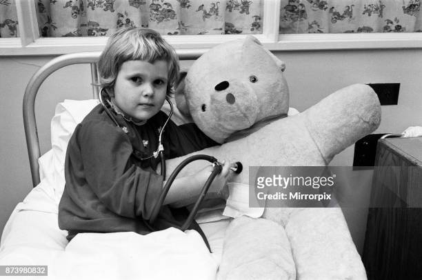Little four year old Michelle Roberts and her big borrowed teddy bear were both progressing very nicely at Northampton General Hospital, after their...