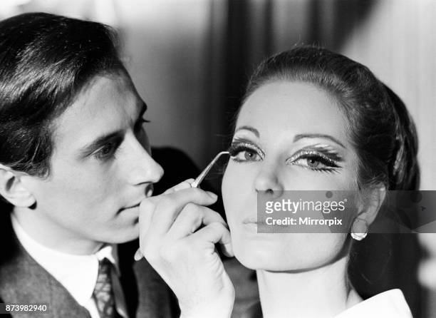 Pablo Manzoni, Eye Makeup Designer, described by Elizabeth Arden as The Picasso of Eye Makeup, demonstrates face makeup during press conference at...