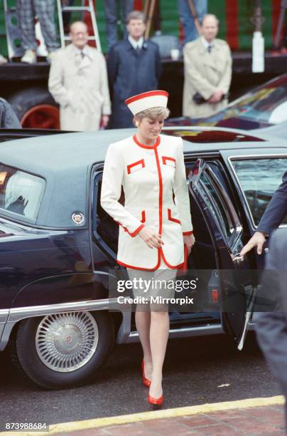 Princess Diana, Princess of Wales, arrives for a church service at St. James Cathedral in Toronto, Canada. With her, though out of shot, are her two...