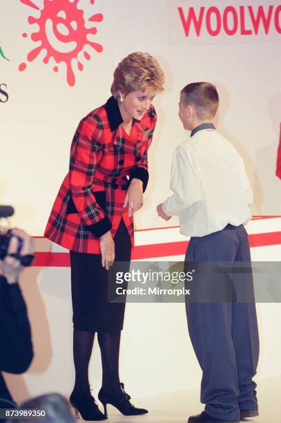 Princess Diana, Princess of Wales, attends and presents awards at the Barnado's Champion Children of the Year ceremony at The Dorchester Hotel in...