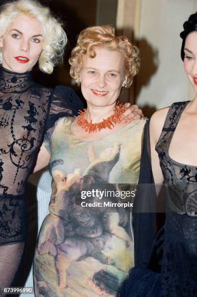 Vivienne Westwood at a showing of her fashion collection at Tall Orders, Soho, London, on the left is model Sara Stockbridge, Westwood's muse,...