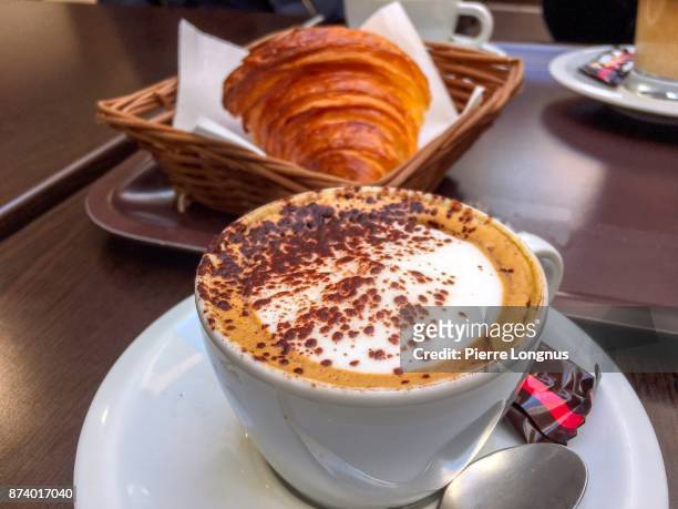 breakfast tray : cafe crème (french cappucino) and a french butter croissant - cappuccino stock pictures, royalty-free photos & images