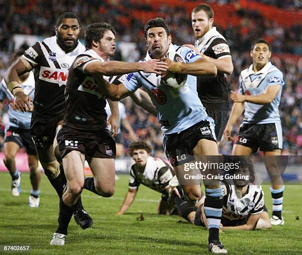 Trent Barrett of the Sharks scores a try during the round ten NRL match between the Penrith Panthers and the Cronulla-Sutherland Sharks at CUA...