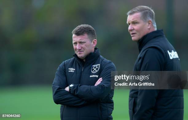 Billy McKinlay and Chris Woods of West Ham United during Training at Rush Green on November 14, 2017 in Romford, England.