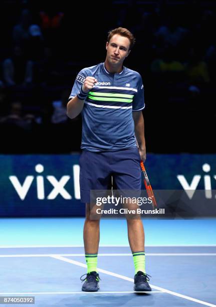 Henri Kontinen of Finland partner of John Peers of Australia celebrates during the doubles match against Jean-Julien Rojer of The Netherlands and...