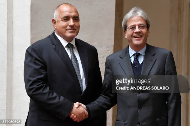 Italian Prime Minister Paolo Gentiloni welcomes Bulgaria's counterpart Boyko Borisov, before their meeting at Palazzo Chigi in Rome on November 14,...