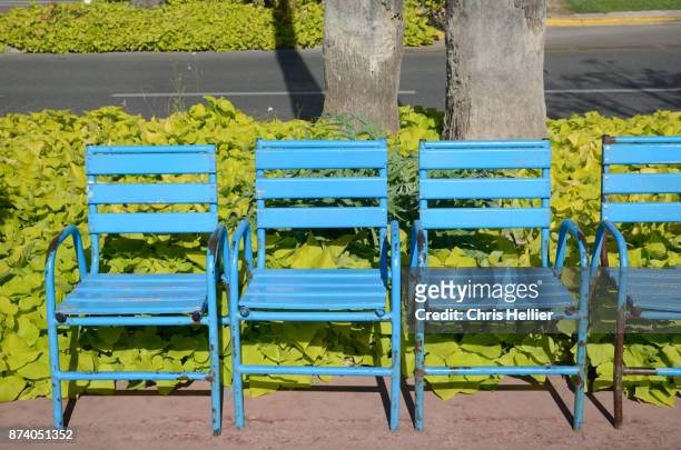 blue chairs on la croisette cannes - cannes croisette stock-fotos und bilder
