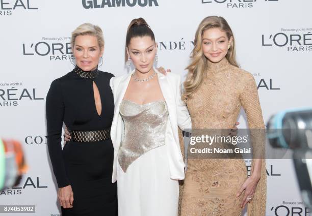 Yolanda Foster, Bella Hadid and Gigi Hadid attend the 2017 Glamour Women of The Year Awards at Kings Theatre on November 13, 2017 in New York City.