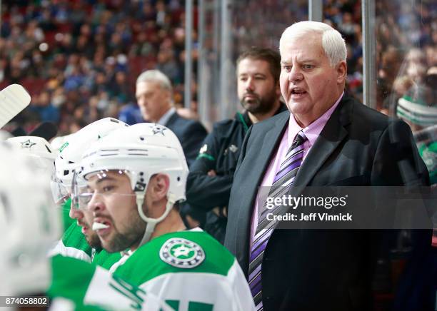 Head coach Ken Hitchcock of the Dallas Stars looks on from the bench during their NHL game against the Vancouver Canucks at Rogers Arena October 30,...