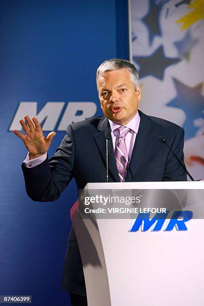 Belgian Finance Minister and chairman Didier Reynders speaks during the elections meeting of Walloon liberal party MR , on May 16, 2009 in Mons. AFP...