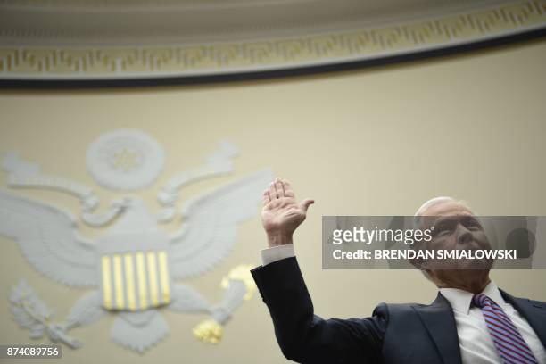 Attorney General Jeff Sessions is worn in before testyfying at a House Judiciary Committee hearing on November 14 in Washington, DC, on oversight of...
