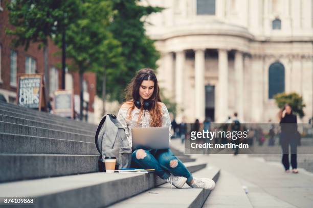 schoolgirl in uk studying outside - learning english stock pictures, royalty-free photos & images