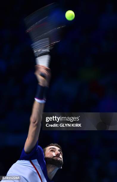 Croatia's Marin Cilic serves against USA's Jack Sock during their men's singles round-robin match on day three of the ATP World Tour Finals tennis...