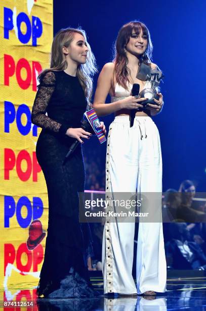 Sabrina Carpenter and Daya present the Best Pop award on stage during the MTV EMAs 2017 held at The SSE Arena, Wembley on November 12, 2017 in...