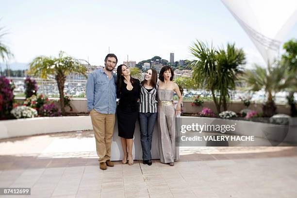 Photo taken with a tilt and shift lens shows French actress Sophie Marceau , Italian actress Monica Bellucci , Italian actor Andrea Di Stefano and...