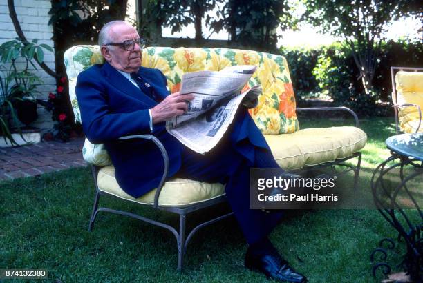 Dr Armand Hammer was an American business manager and owner, most closely associated with Occidental Petroleum, photographed at home sitting in his...