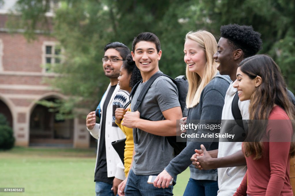 New Friends Walking on University Campus