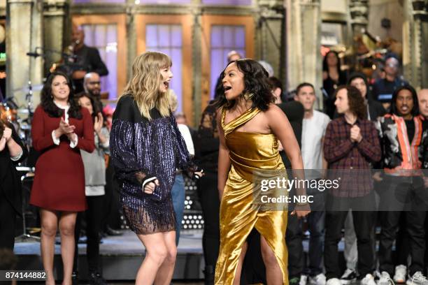 Episode 1730 -- Pictured: Musical Guest Taylor Swift with Host Tiffany Haddish during "Goodnights & Credits" in 30 Rockefeller Plaza --