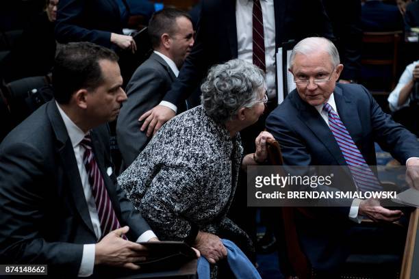 Attorney General Jeff Sessions and his wife Mary Blackshear Sessions talk during a break in a hearing of the House Judiciary Committee on Capitol...