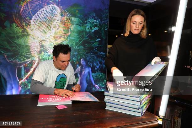 Star Photographer David Lachapelle is seen during a book signing session for the release of his new books" Lost+Found" and "Good News" at the Taschen...