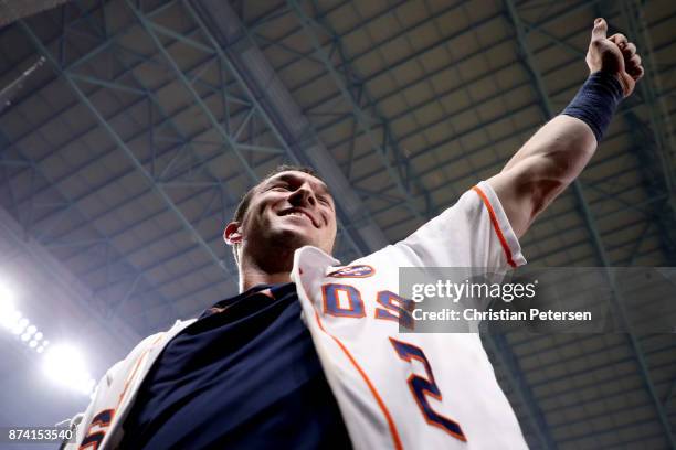 Alex Bregman of the Houston Astros celebrates after defeating the Los Angeles Dodgers in game five of the 2017 World Series at Minute Maid Park on...