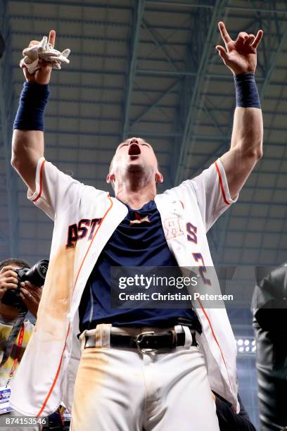 Alex Bregman of the Houston Astros celebrates after defeating the Los Angeles Dodgers in game five of the 2017 World Series at Minute Maid Park on...