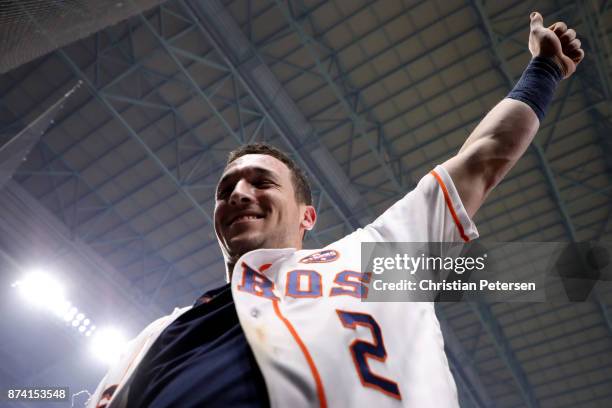 Alex Bregman of the Houston Astros celebrates after defeating the Los Angeles Dodgers in game five of the 2017 World Series at Minute Maid Park on...