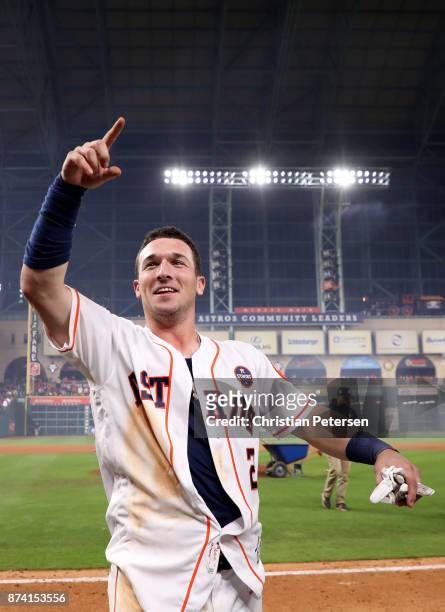 Alex Bregman of the Houston Astros celebrates after defeating the Los Angeles Dodgers in game five of the 2017 World Series at Minute Maid Park on...