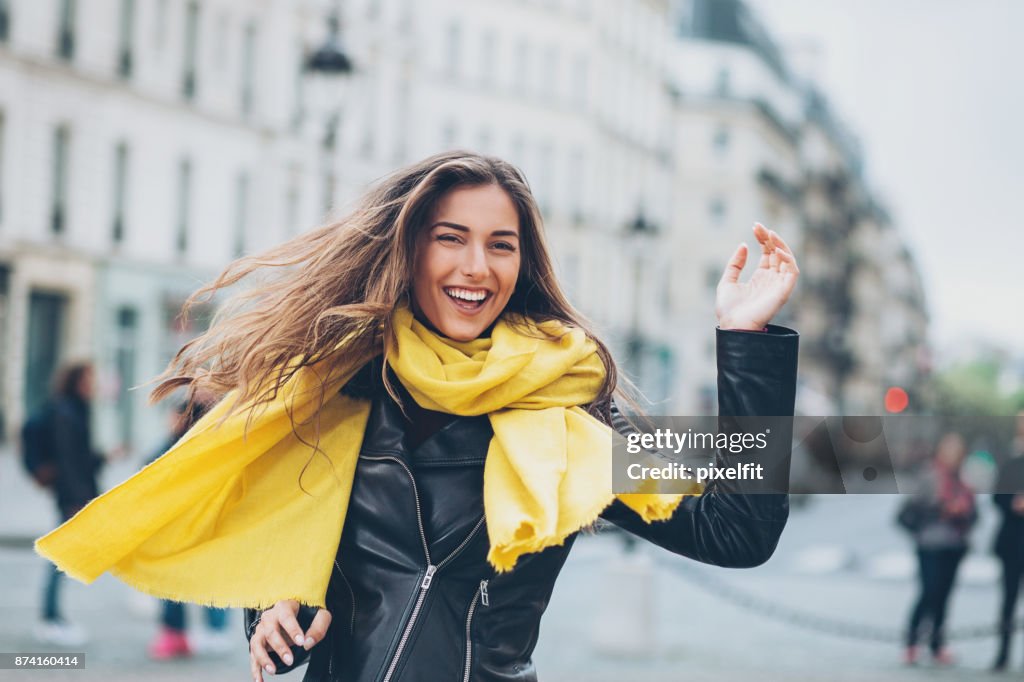 Young woman running on the street