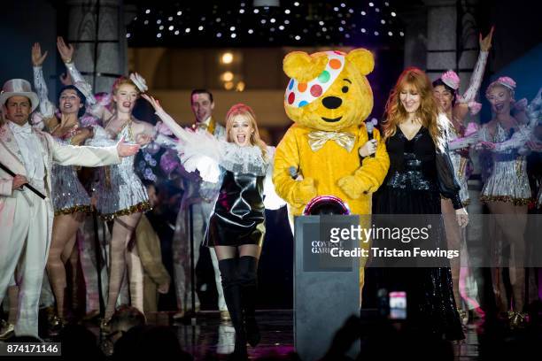 Kylie Minogue, Charlotte Tilbury and BBC Children in Need's Pudsey Bear switch on the Covent Garden Christmas lights at Covent Garden on November 14,...