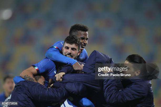 Riccardo Orsolini with his teammates of Italy celebrates after scoring the team's third goal during the international friendly match between Italy...