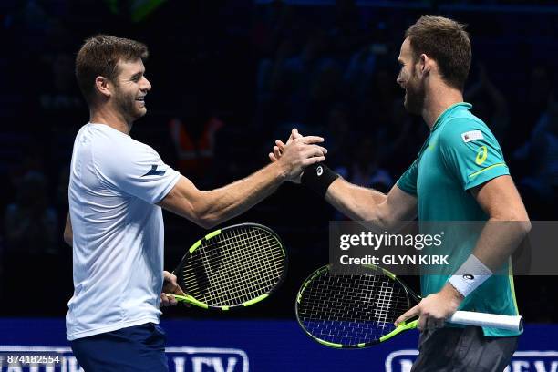 S Ryan Harrison and New Zealand's Michael Venus celebrate a match point against France's Pierre-Hugues Herbert and France's Nicolas Mahut after their...